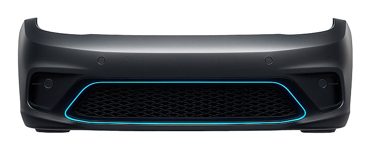 Black front bumper with central air grille and blue‑accented contour