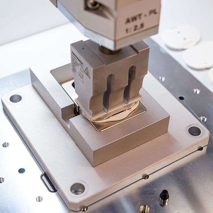 Ultrasonic welding of a film-plastic component for a glucose monitor with welding parts