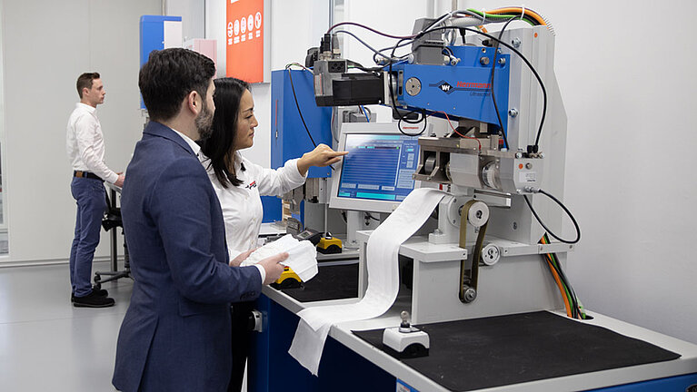 Colleagues perform welding tests on a diaper